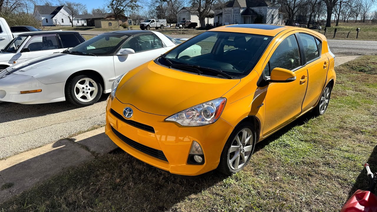 I Bought a 2014 Toyota Prius C for $2K MORE than I Paid for my Tesla!!! *CRAZY*