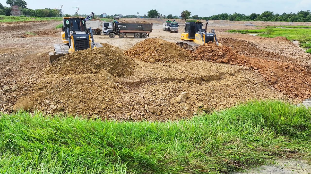 Wonderful Bulldozer SHANTUI Push Stone Into Mud,Dump Truck 25Ton Unloading Stone Filling Lake