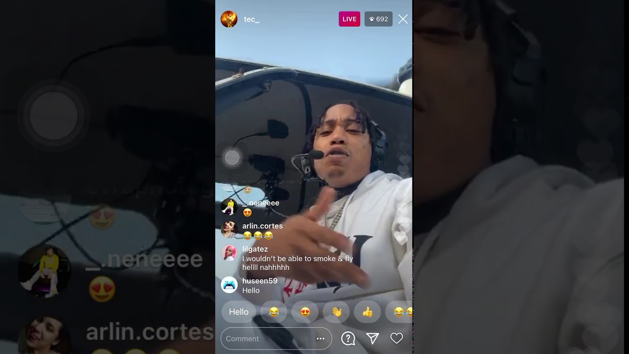 Rapper Tec on a helicopter smoking a BackWood