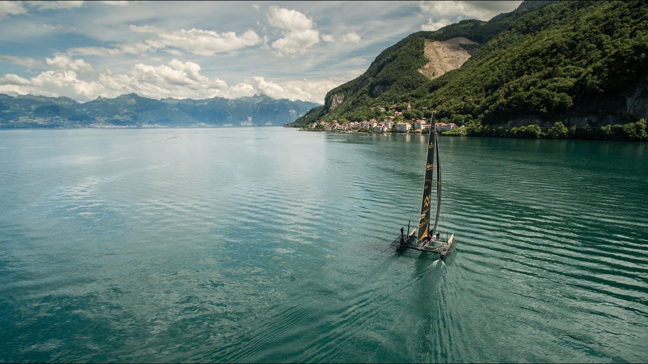 Aerial view of Ladycat powered by Spindrift racing across beautiful Geneva Lake Landscape!