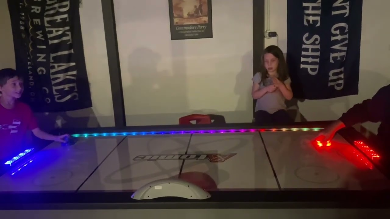 Thanks giving 2023 atomic air hockey table in action