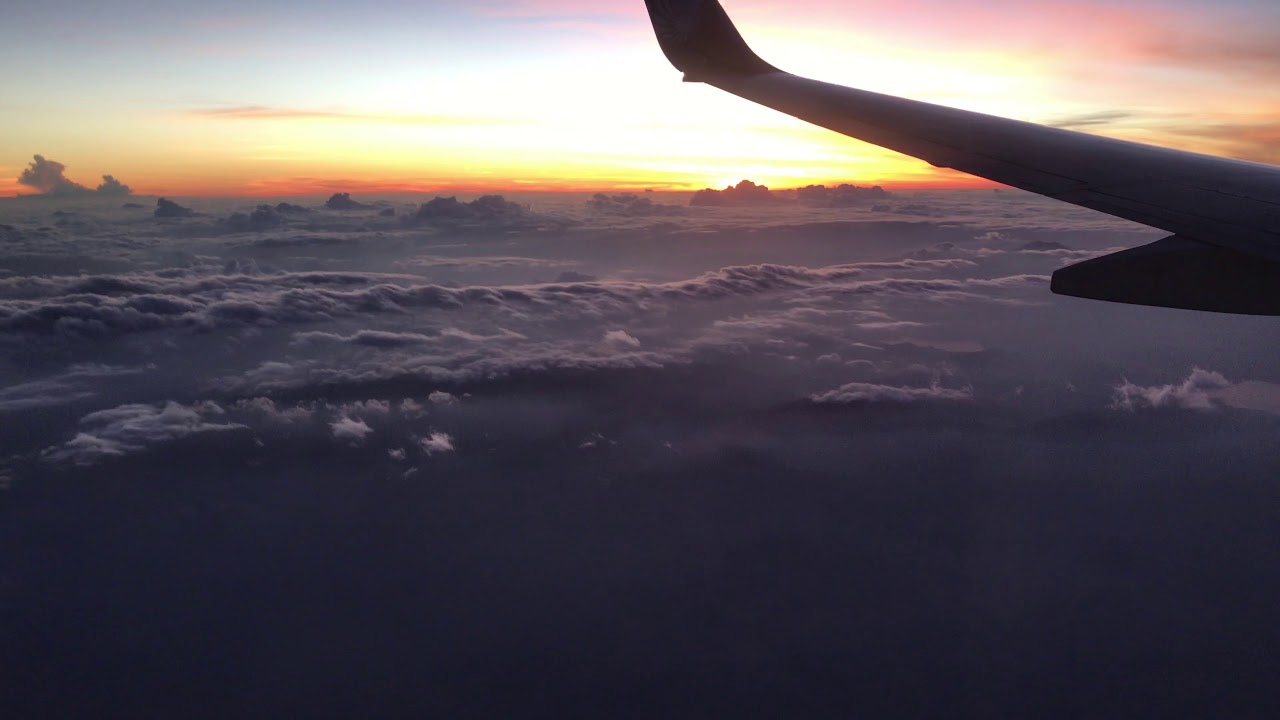 Sunrise view from Flying Plane || Plane flying over clouds || Beautiful sunrise view