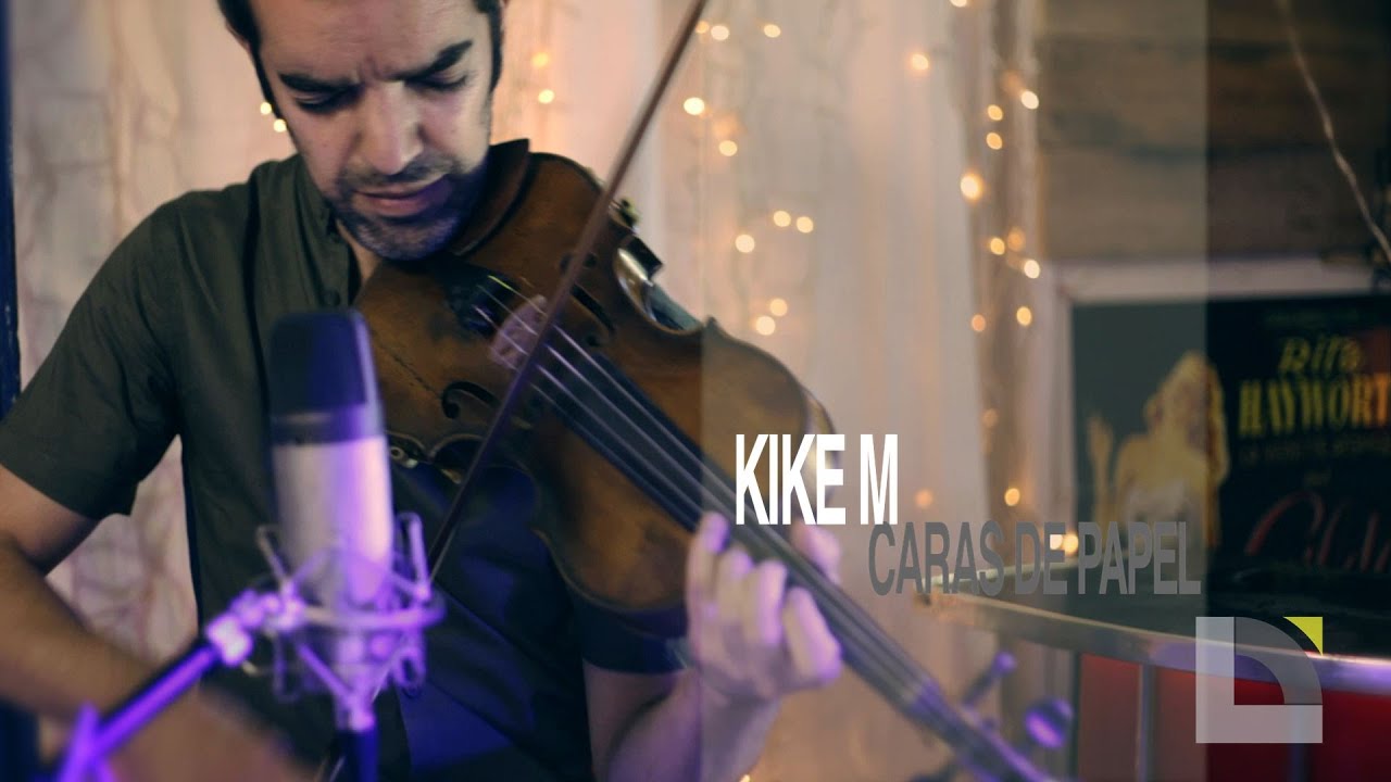 Kike M  - Caras de papel