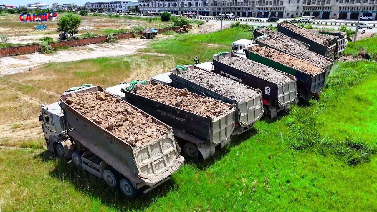 Amazingly Showing Start Landfill Project by 25Ton Dump Trucks Unloading Soil & Dozer KOMATSU Pushing