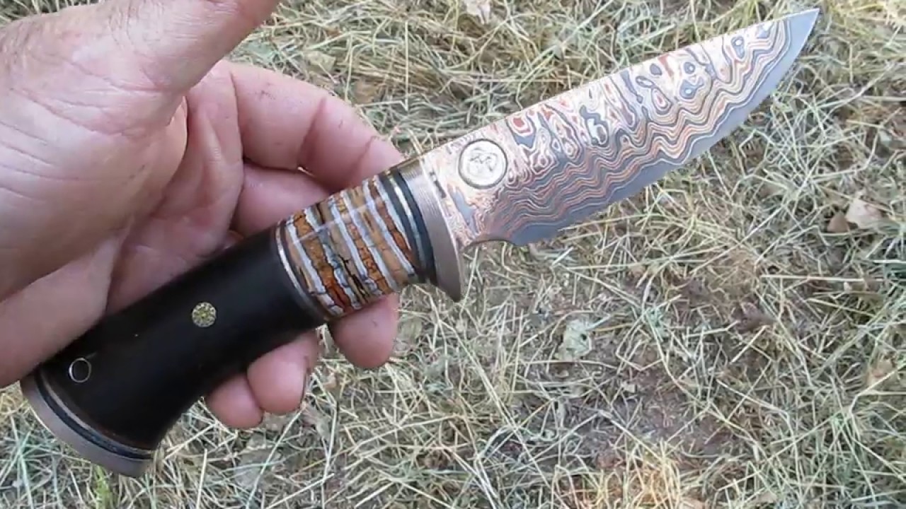 Copper damast knife , mammoth molar , mokume gane, ebony wood