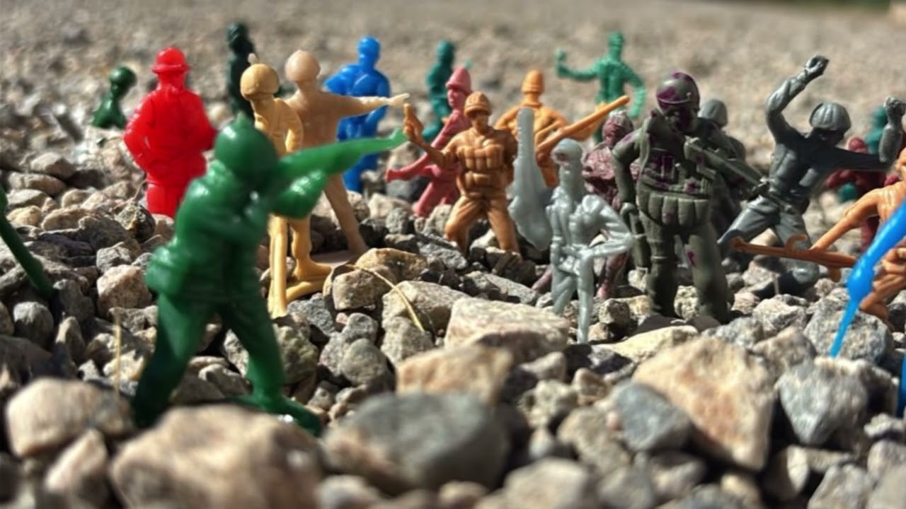 The greens shoots the gray prisoners ￼