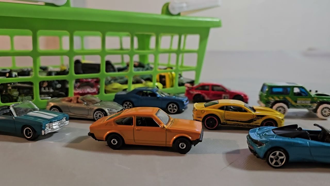 My first ASMR video whispering about toy cars [visuals] and soft sounds