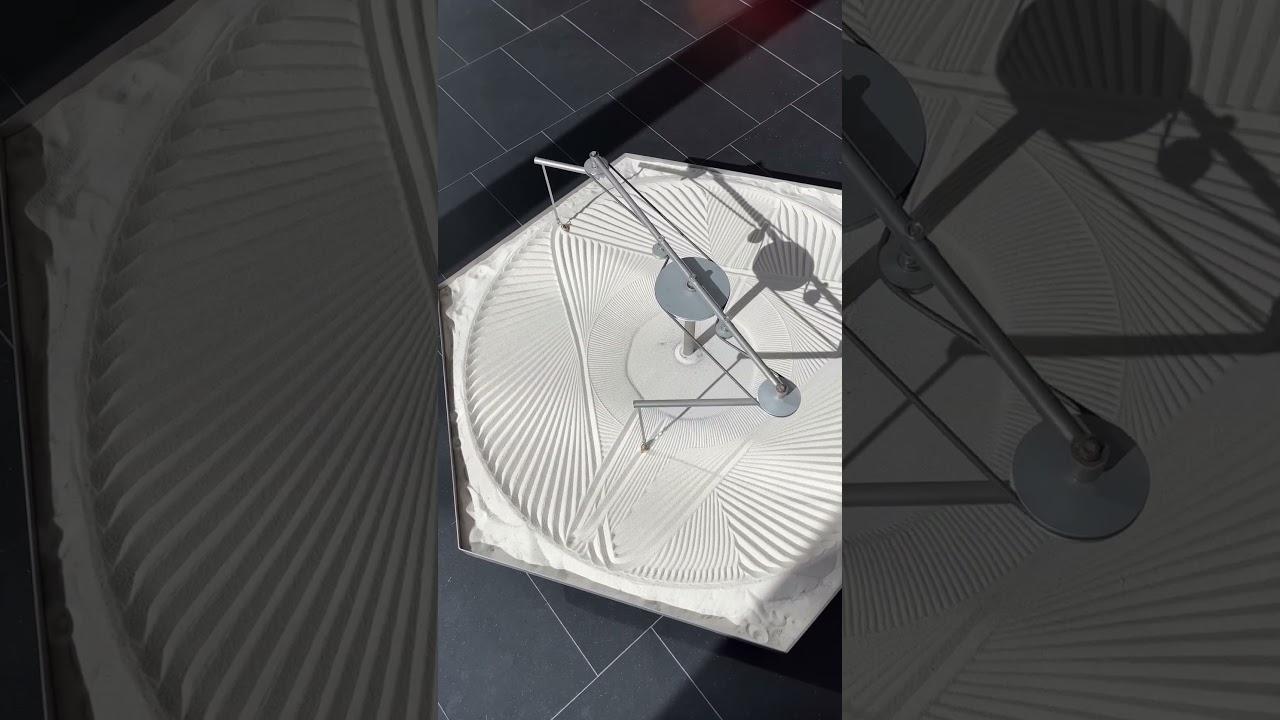Moment of silence. Relax for 1 minute in Zen garden - bowl of sand