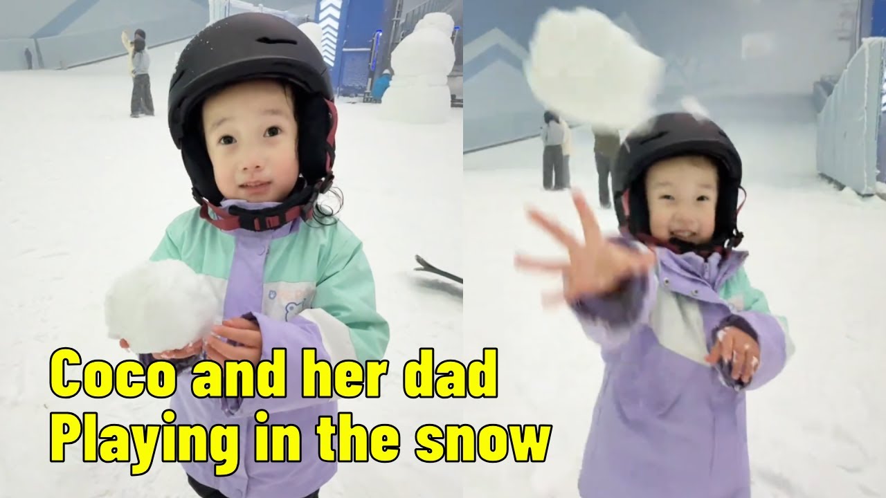 Coco and her dad were having so much fun playing in the snow park, having snowball fights