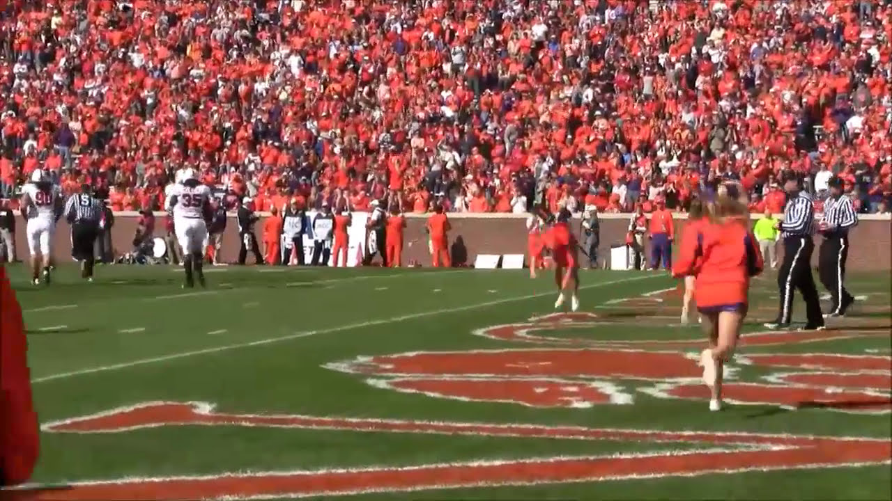 College Cheerleaders Tumbling At Football Games