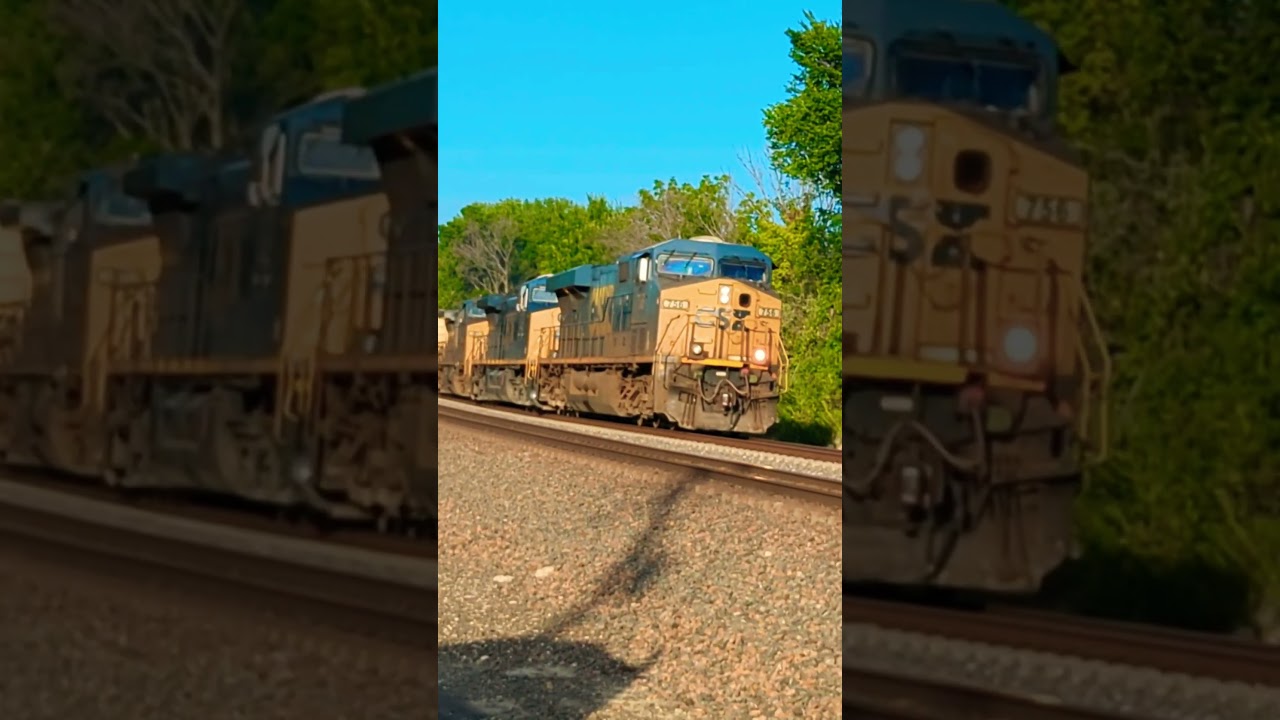 CSX grain train passes Clair Road on the BNSF Emporia Sub