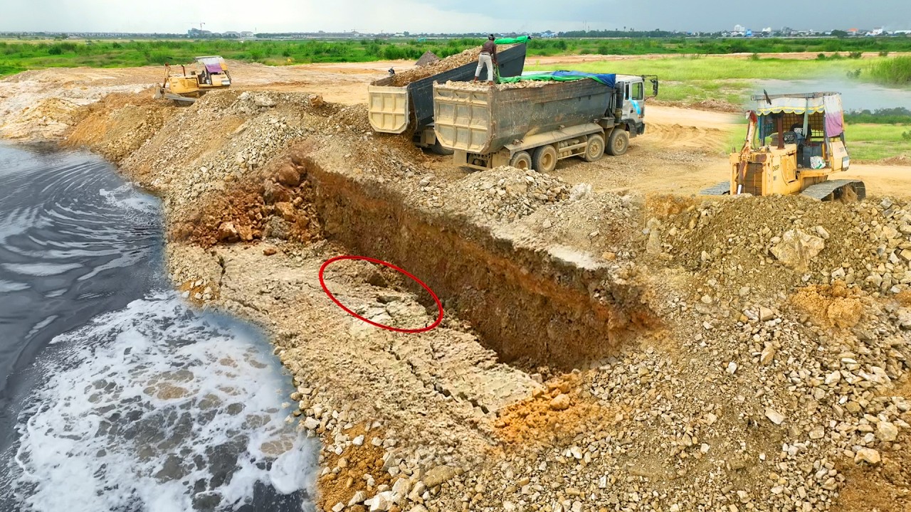 Amazing, Continue slide Repair Land BY Bulldozers KOMATSU D60P Pushing rocks & 25T Dump Trucks rocks