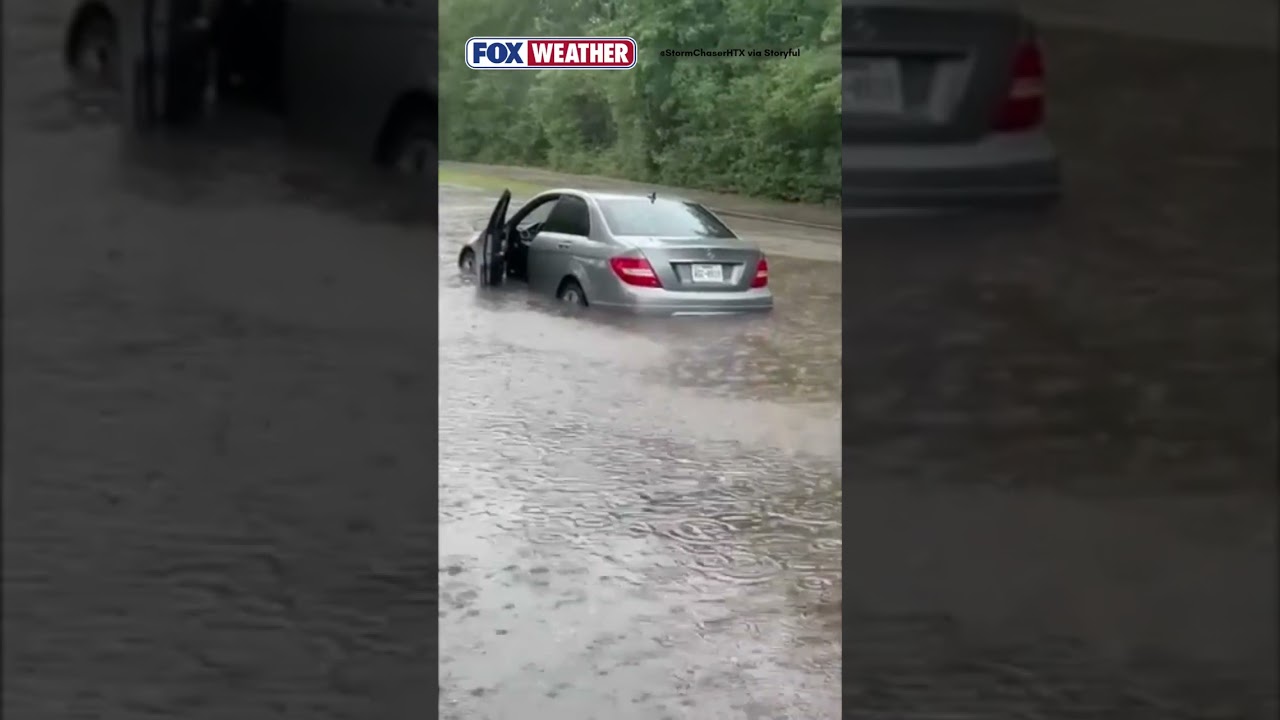 Watch: Torrential Rain Causes Flash Flooding in The Woodlands, Texas, Stranding Driver