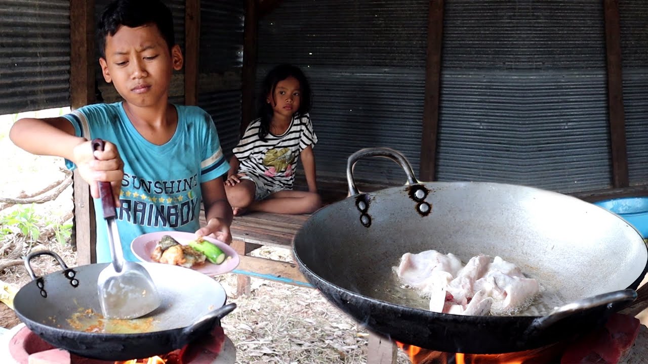 Frying Fish With Rice Powder For Lunch And Eating With His Sister