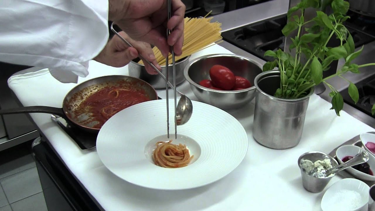 Trovato makes a pasta dish at 2 Michelin Arnolfo