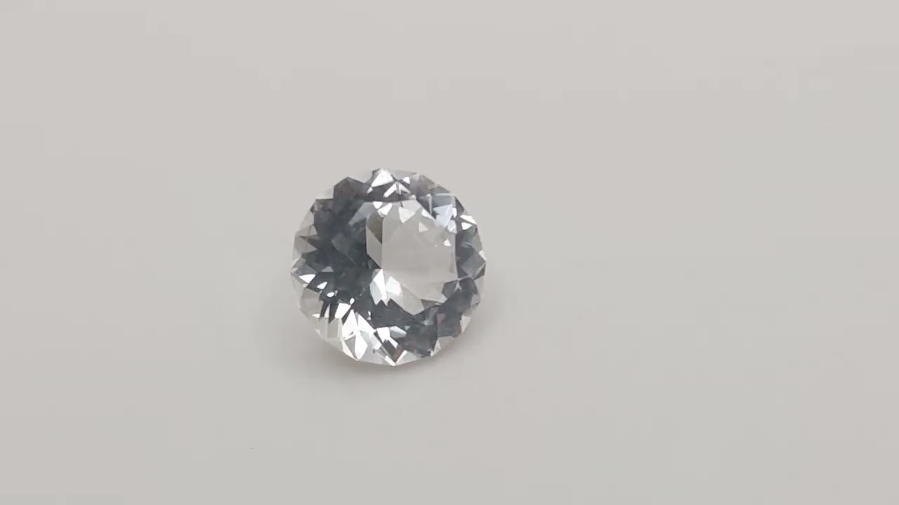 Clear Brazilian Topaz 10.96 ct 13.7 mm mixed cut round