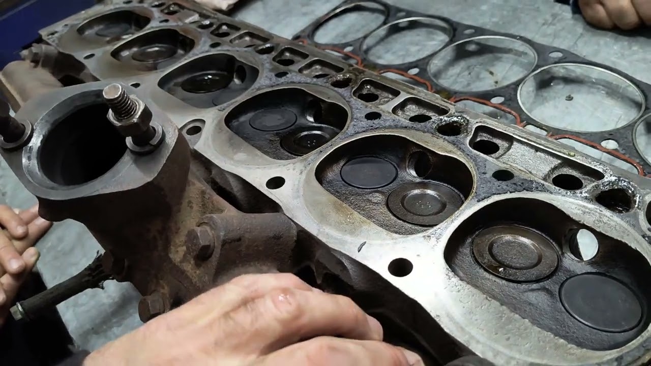 Tapa de cilindros,apriete,re apriete,y Junta.