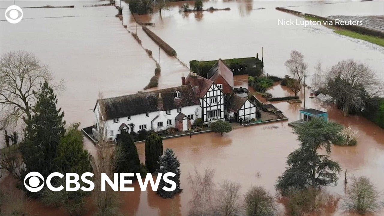 A couple's home in England kept flooding. So they built a wall to stop it.