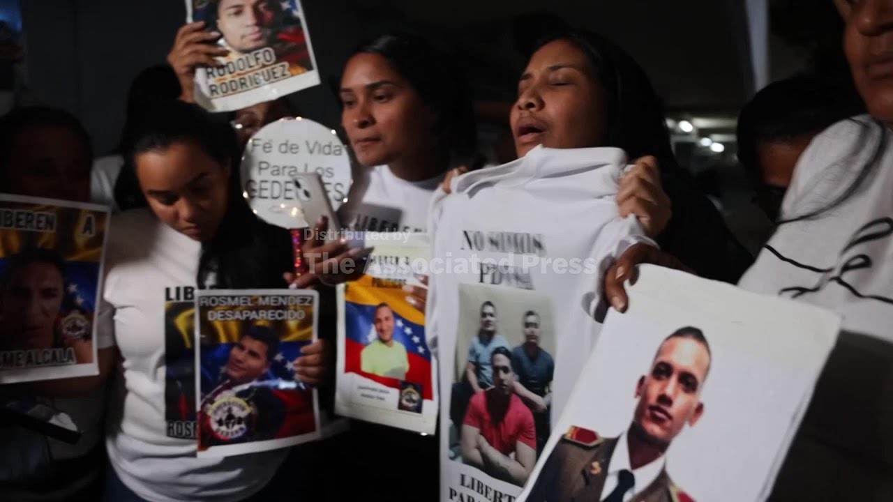 Families outside notorious Venezuelan prison jubilant at news of prisoner amnesty