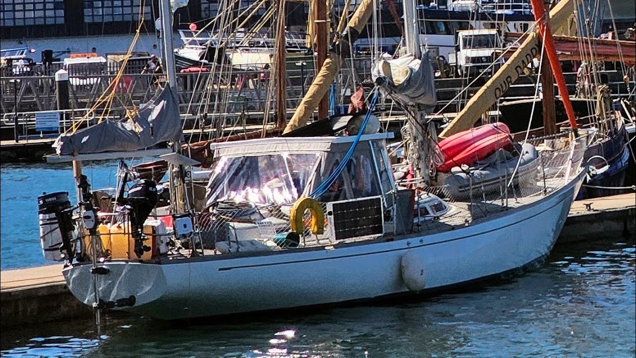 Brixham Harbour. Life aboard. Finishing wiring our solar panels.