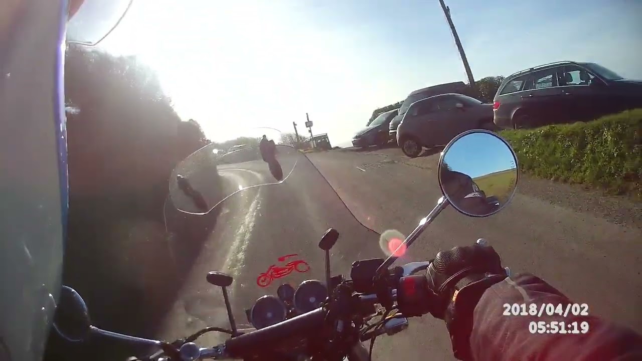 Spectacular views towards Rame Head as my Royal Enfield Interceptor cruises along Whitsand Bay. 