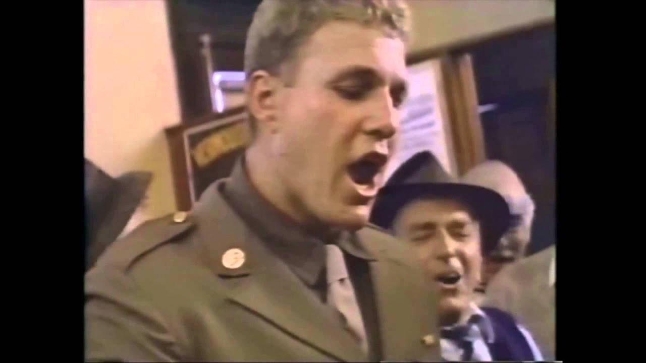 Reb brown drinking beer