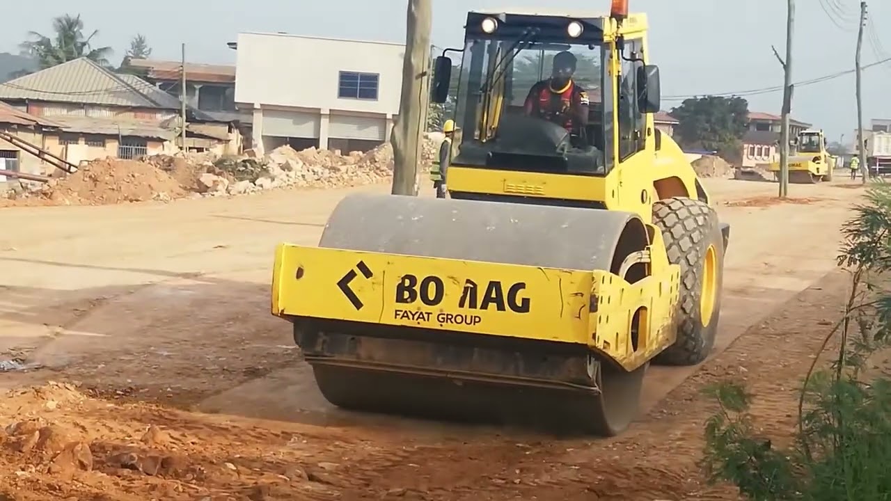 It's his first time operating a grader.