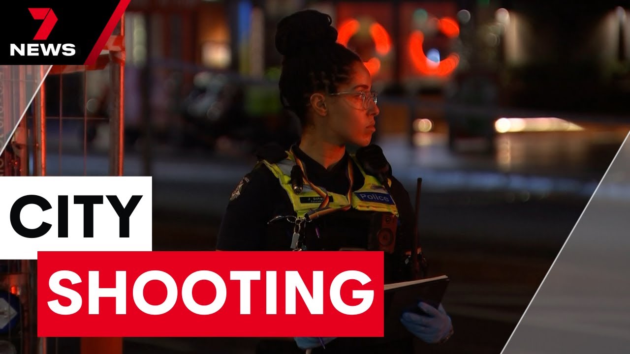 Gunman on the run after shooting just metres from Victoria police headquarters | 7NEWS