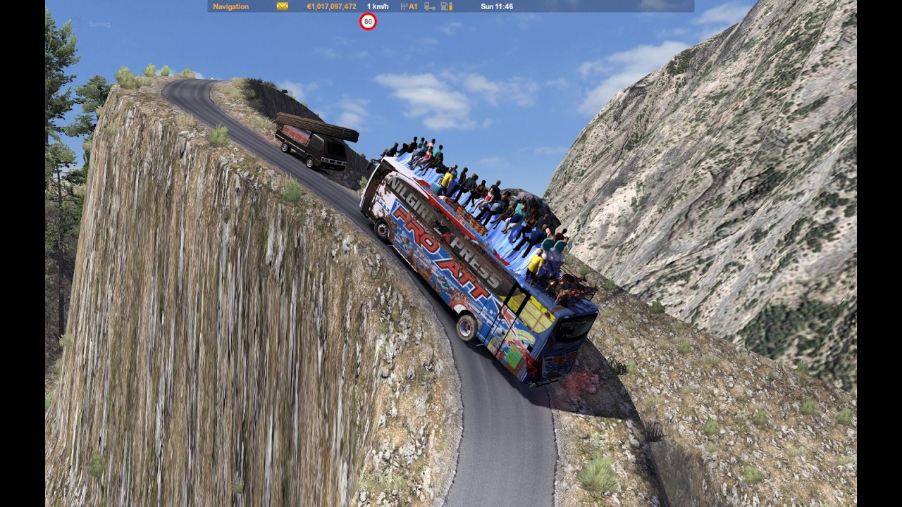 A bus driver from Uttar Pradesh skillfully navigates the steep, winding road from Nepal to India