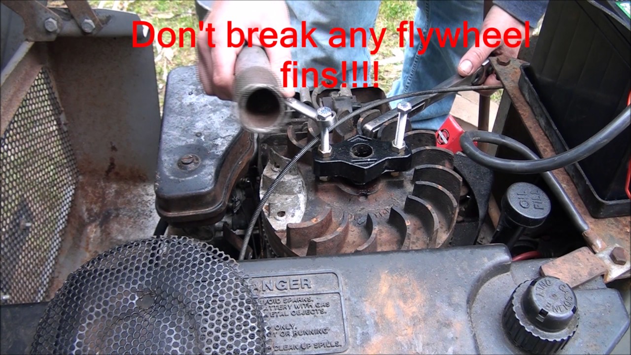 How To REMOVE a FLYWHEEL on a Briggs and Stratton Riding Lawnmower engine motor
