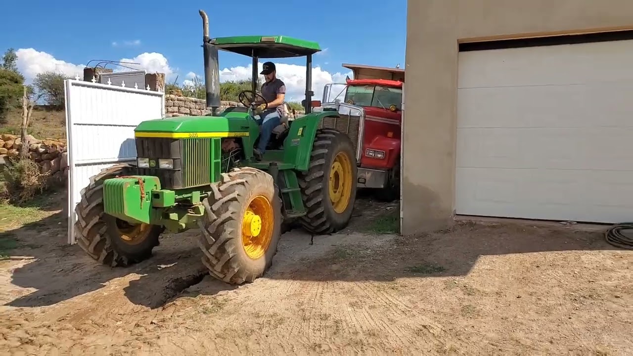 John Deere 6403 pulling a dump truck. #JohnDeere #Stuck #Towing #DumpTruck #Mudding