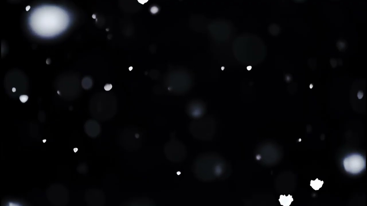 Neige qui tombe doucement pour projeter via projecteur sur fond noir