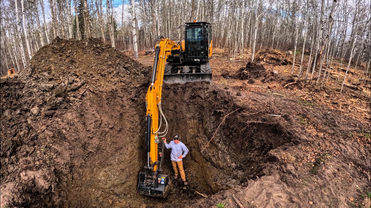SANY SY80 is a beast! Digging holes and moving trees