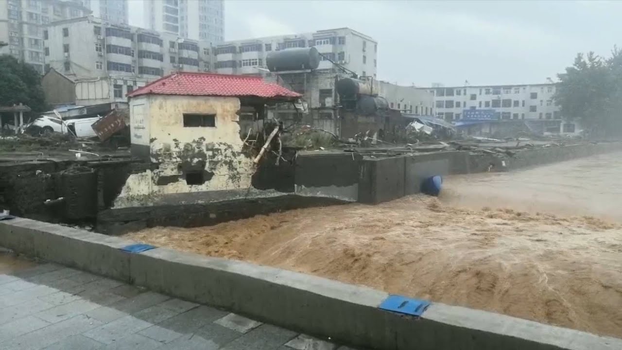 GLOBALink | China raises emergency response as downpours, flooding continue