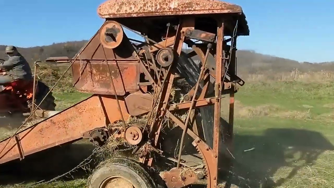 ALLIS CHALMERS WD45 BALING WITH AN ALLIS CHALMERS ROTO BALER