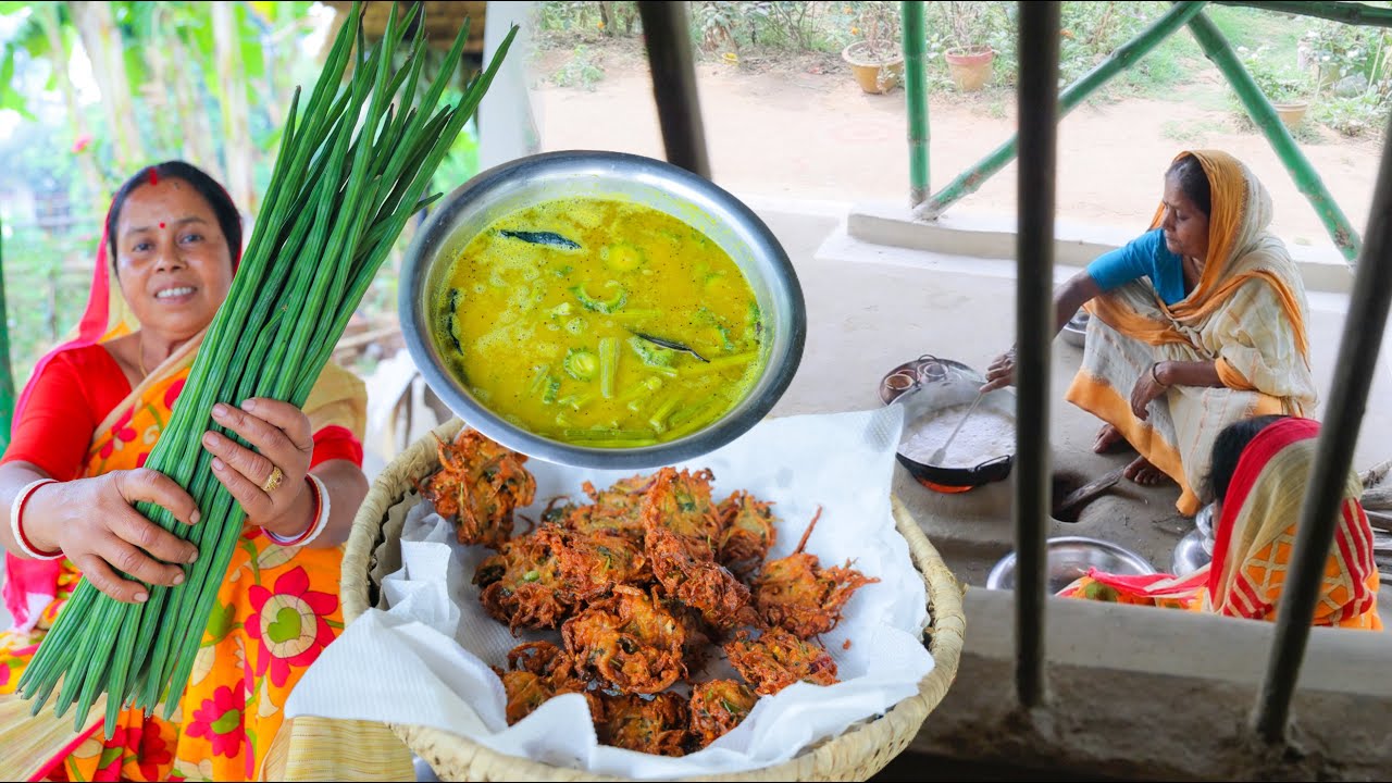 সজনে ডাটা ও উচ্ছে দিয়ে তেতো ডাল তার সাথে বৃষ্টির মধ্যে গরম গরম পিয়াজি |