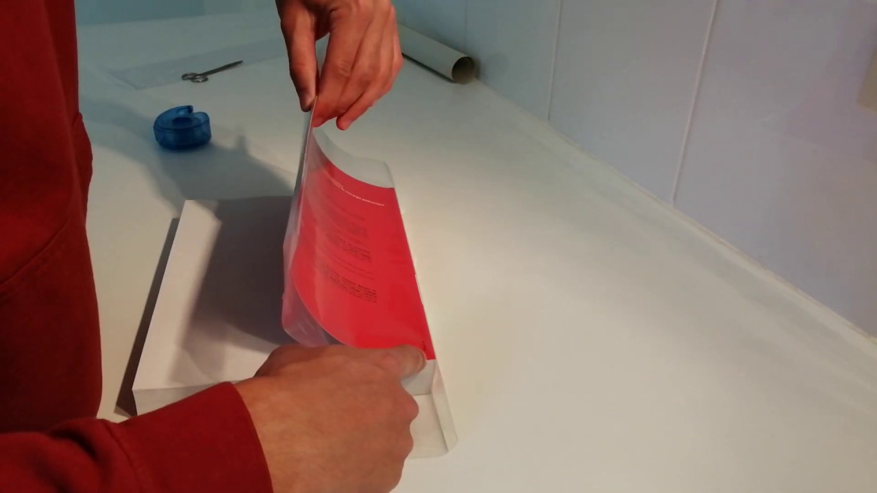 Couvrir un livre sans scotcher la couverture