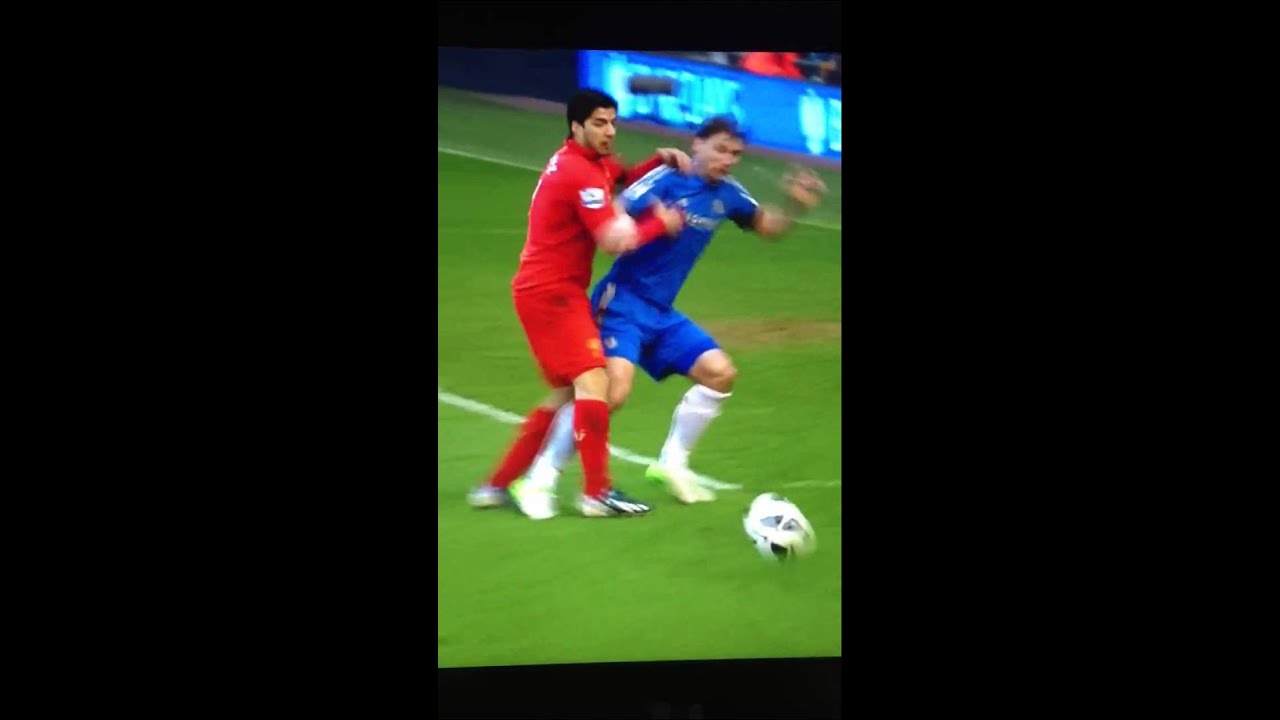 Suarez biting Ivanovic's arm