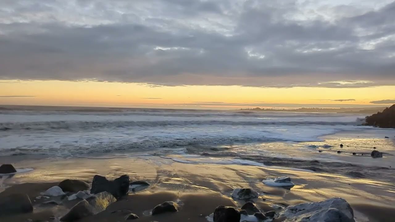 Dark Waves Glowing Sun