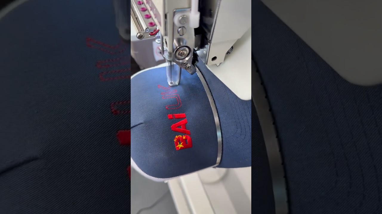 BAi Mirror Cap Stitch-out on Yupoong Classics Trucker