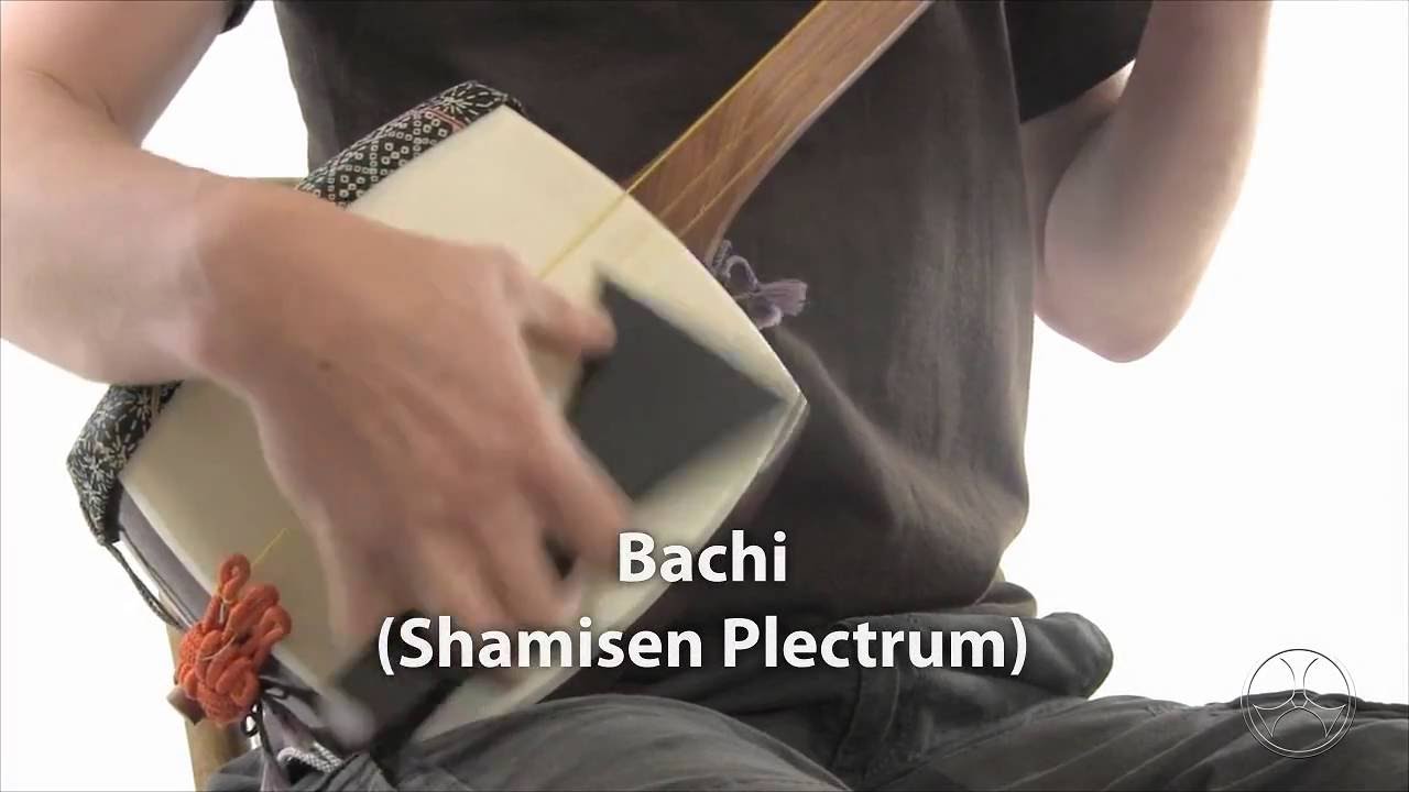 Playing Shamisen with Different Plectrums
