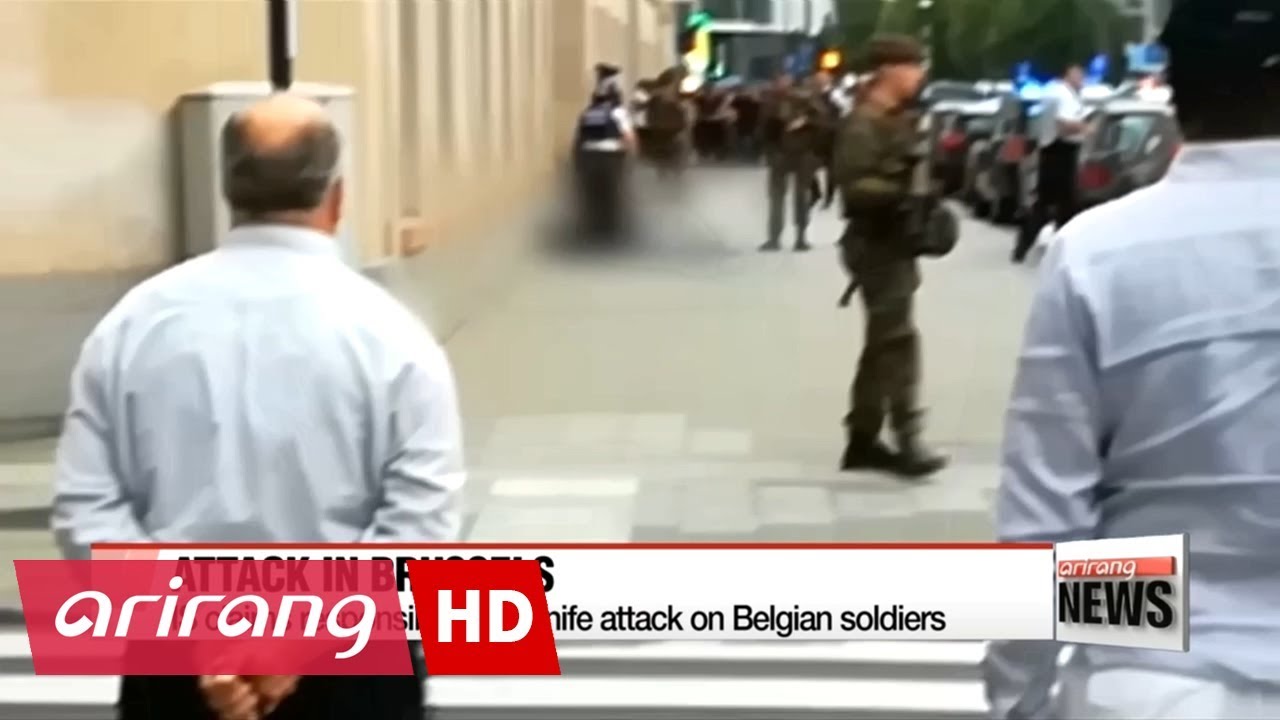 Lone attackers injure security officers in London, Brussels