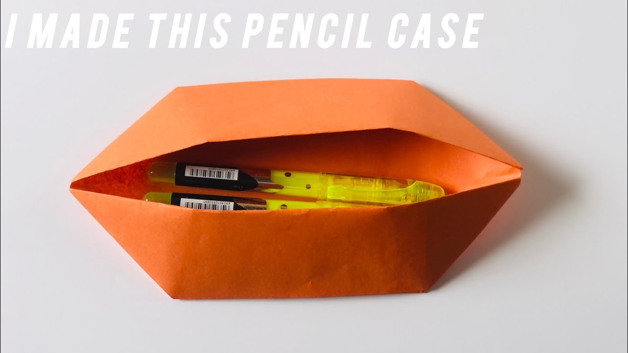Fold paper or use fabric, shape it into a small pouch, and add a zipper or flap.