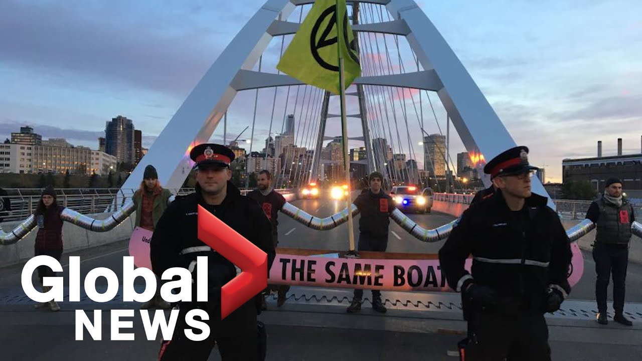 Heated confrontations as climate activists block Edmonton bridge during morning rush hour
