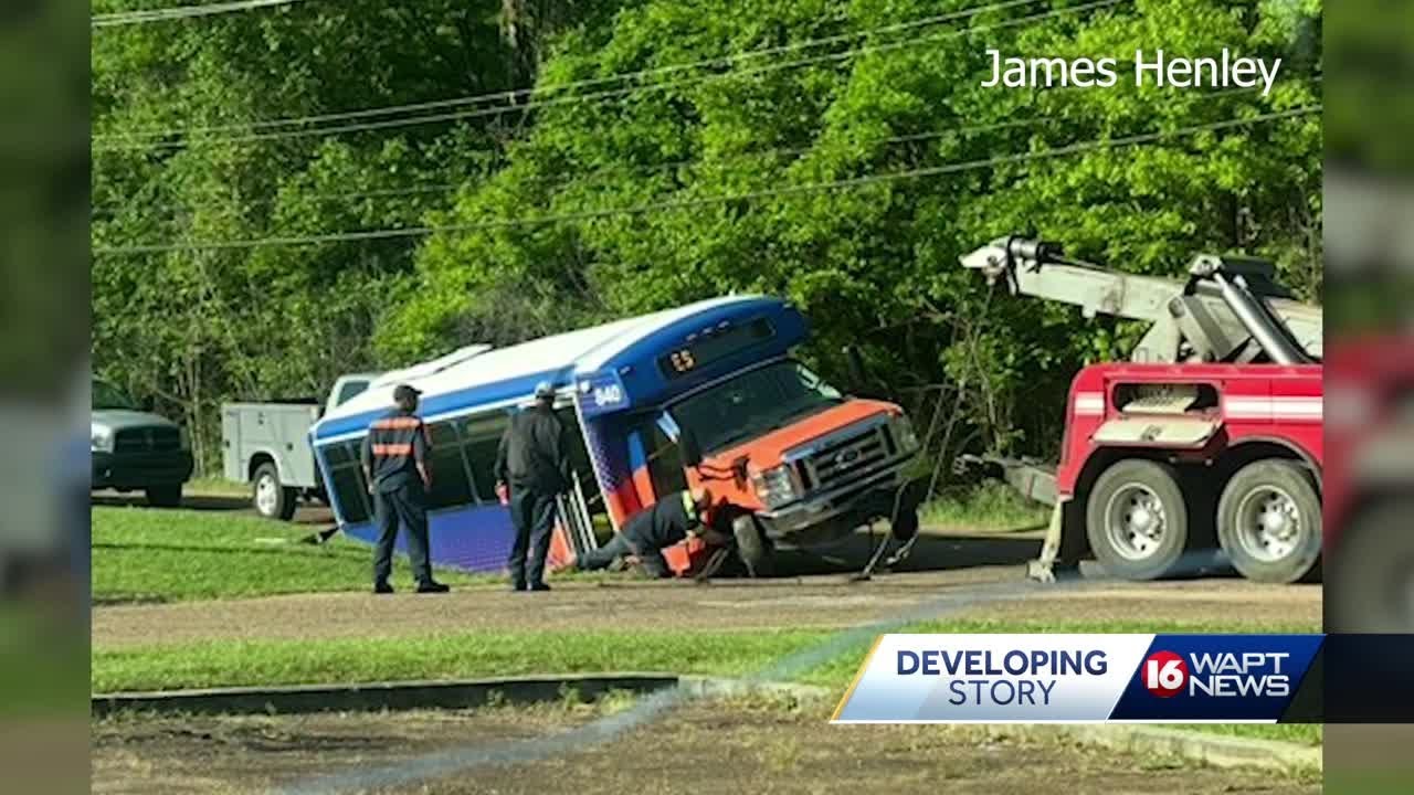 Bus gets stuck in ditch that residents say has been problem