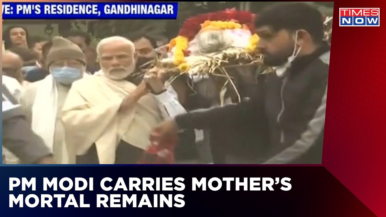 Prime Minister Modi Carries Mortal Remains Of Mother On Shoulder As Last Rites Underway