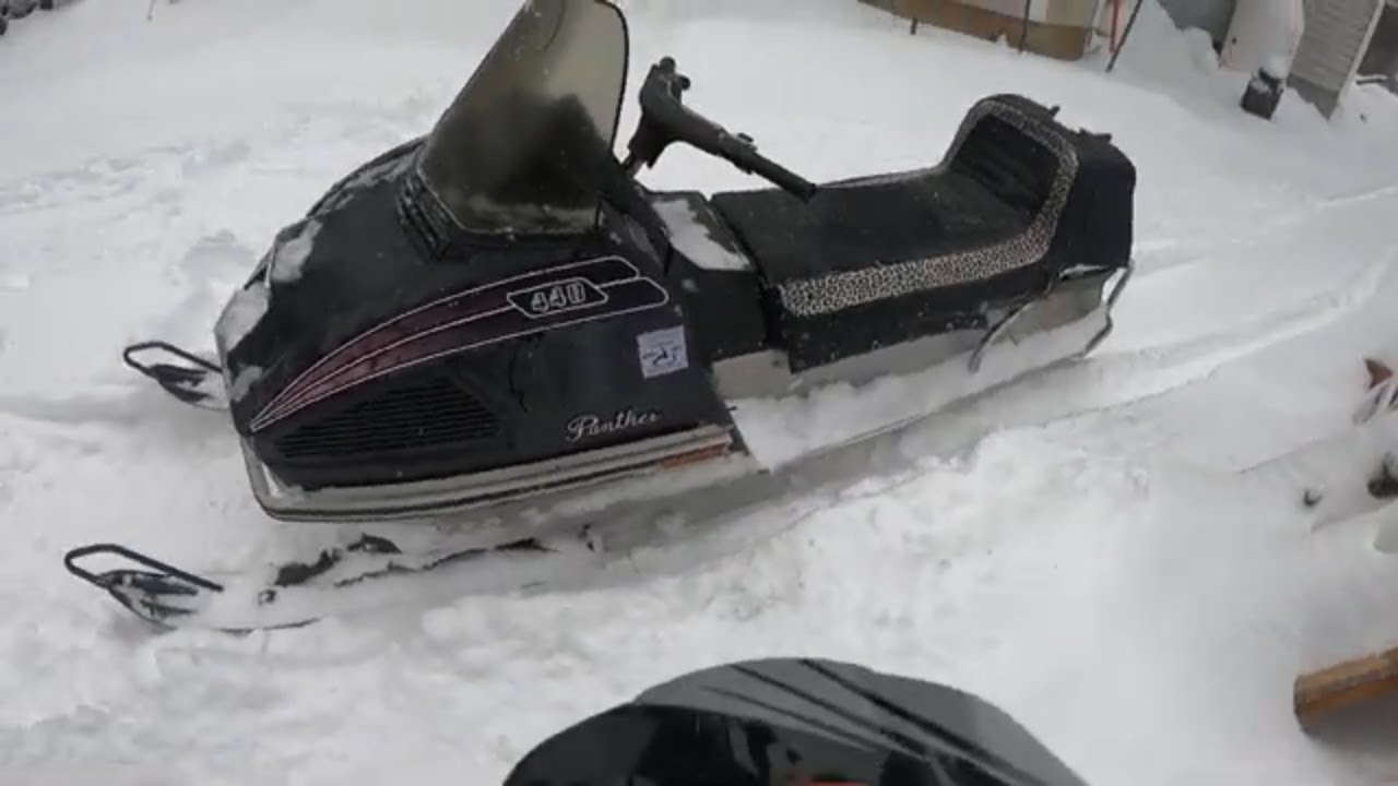 Snowmobiling fun on a vintage Arctic Cat Panther