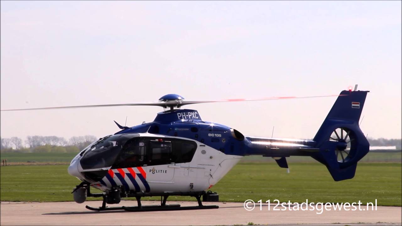 Politiehelikopter PH-PXC vertrekt van vliegveld Midden Zeeland