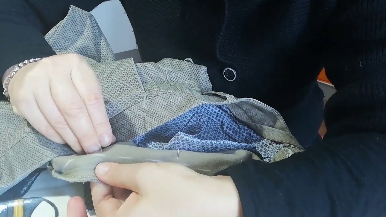 STRINGERE VITA AD UN PANTALONE