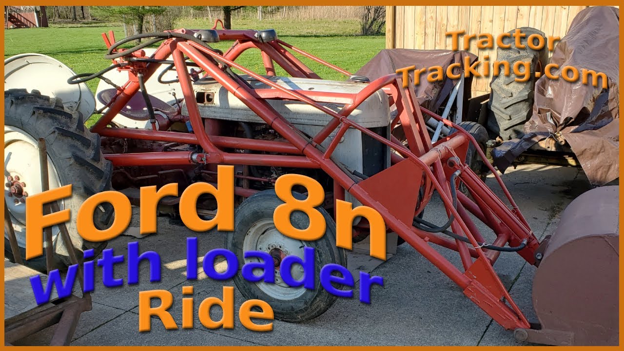 Ford 8n with loader runs down the road
